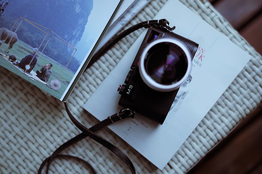 black point-and-shoot camera on book, strap, electronics, video camera HD wallpaper