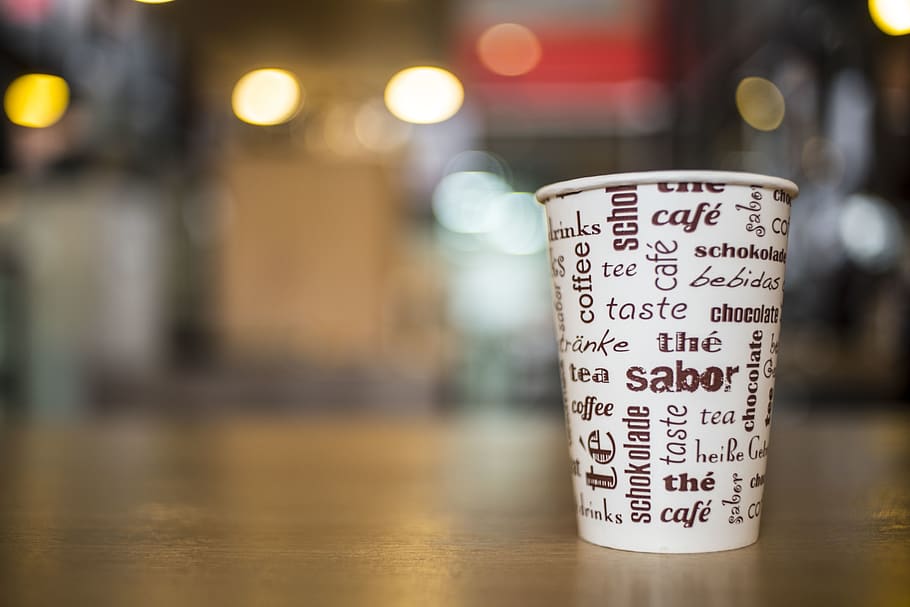 Selective-focus Photography of White and Brown Coffee Cup on Brown Wooden Surface HD wallpaper
