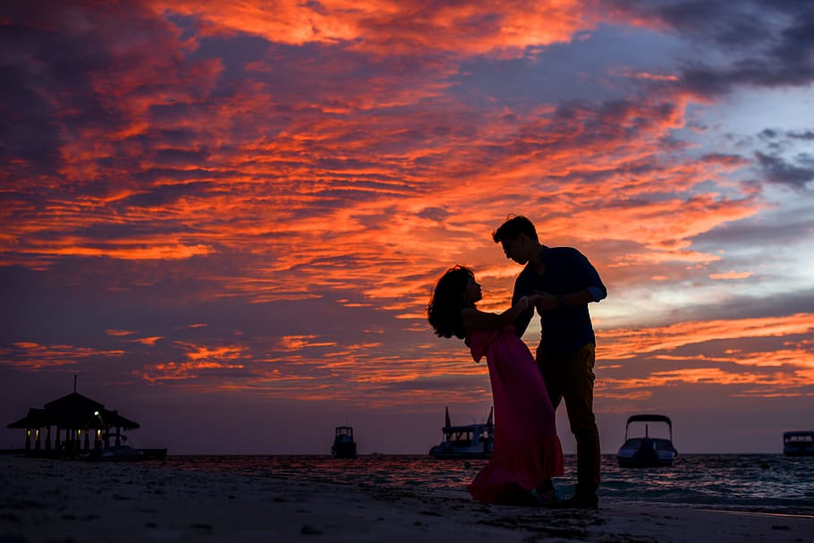 Man and Woman on Beach during Sunset, affection, couple, happiness HD wallpaper
