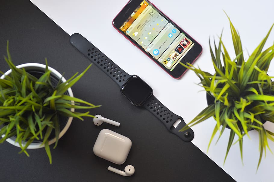 Apple Watch between iPhone and AirPods on table, technology, wireless technology, HD wallpaper