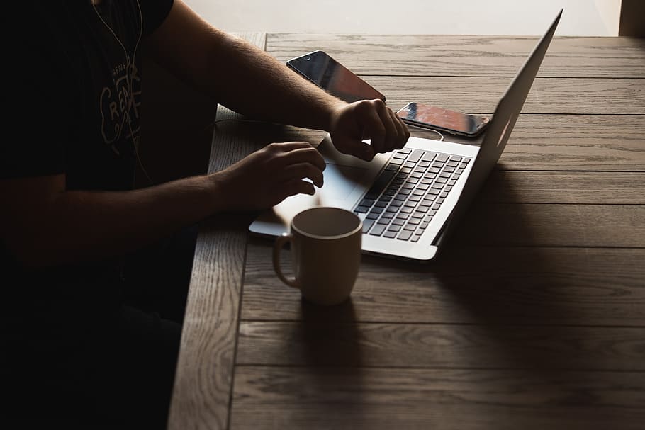 computer, cup, gadgets, laptop, mug, person, table, one person HD wallpaper