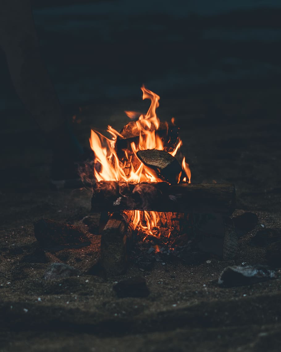 flaming bonfire on grey sand, heat - temperature, burning, flame HD wallpaper