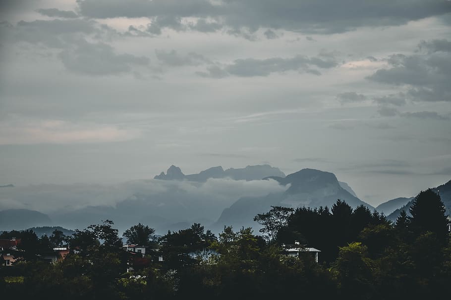 Landscape Photography of Mountain and Trees Under Dark Clouds HD wallpaper