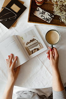 Woman read book and drink coffee, hands, relaxing, reading, time HD wallpaper