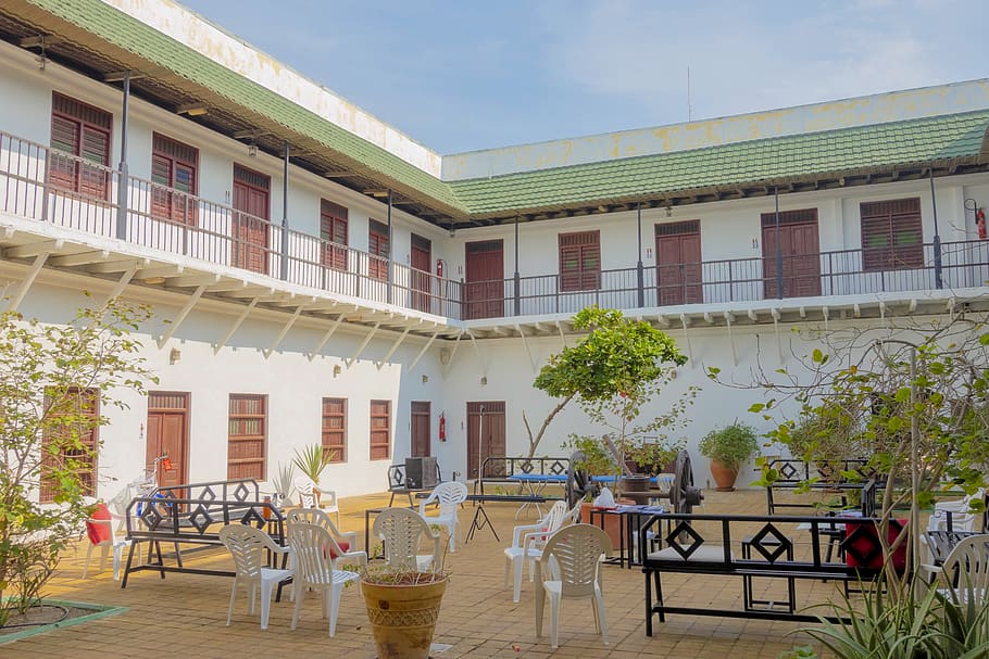 Patio Benches and Chairs Outside 2-storey Building, architecture HD wallpaper