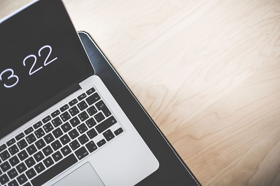 Turned on Macbook Pro on Brown Wooden Table, digital, electronics HD wallpaper