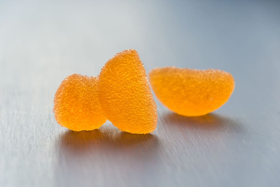 Close-Up Photography of Orange Candies, 4k wallpaper, blur, candy