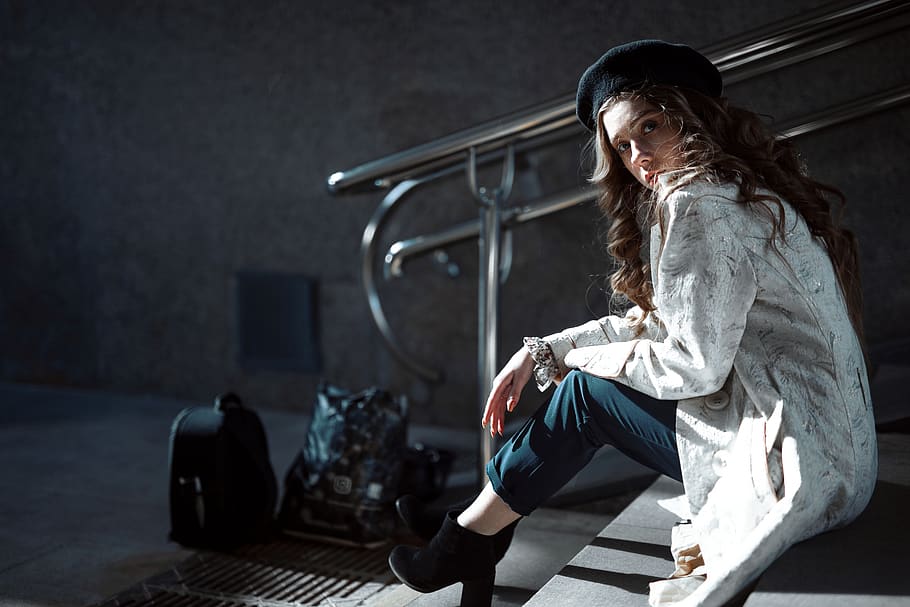 woman wearing white coat sitting on stair, one person, lifestyles HD wallpaper