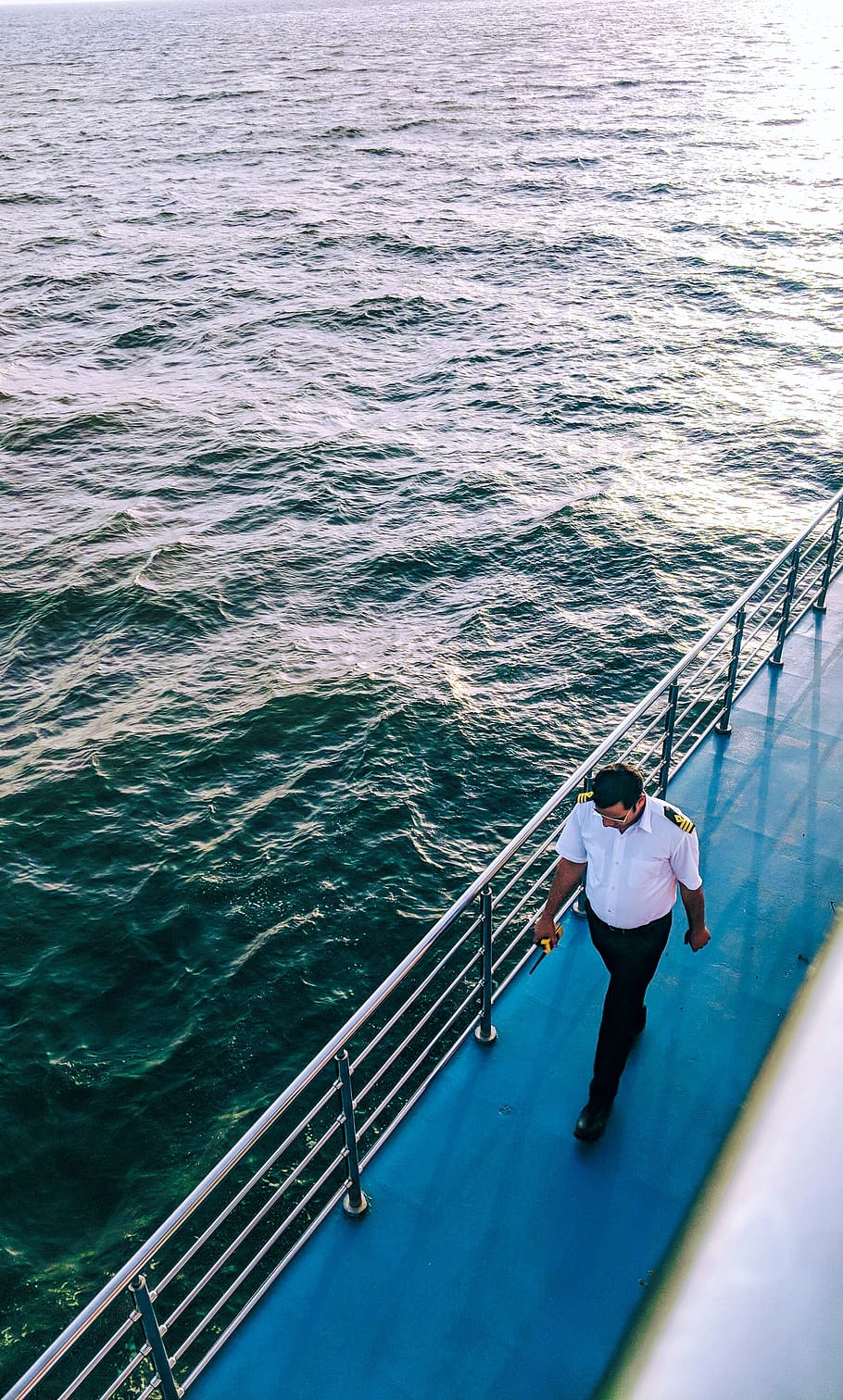 man walking on blue boat surface, person, human, people, sea HD wallpaper