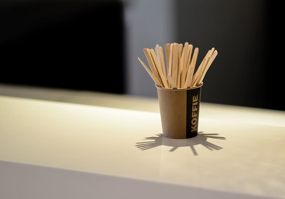 Brown Popsicle Sticks in Brown Disposable Cup, blur, blurred background HD wallpaper