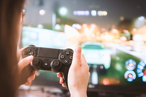 Young girl with gamepad playing games on TV, adult, women, one person HD wallpaper
