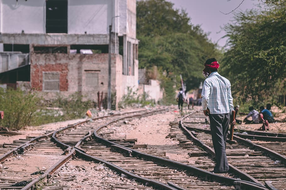 man standing on train rails, person, people, human, railway, transportation HD wallpaper