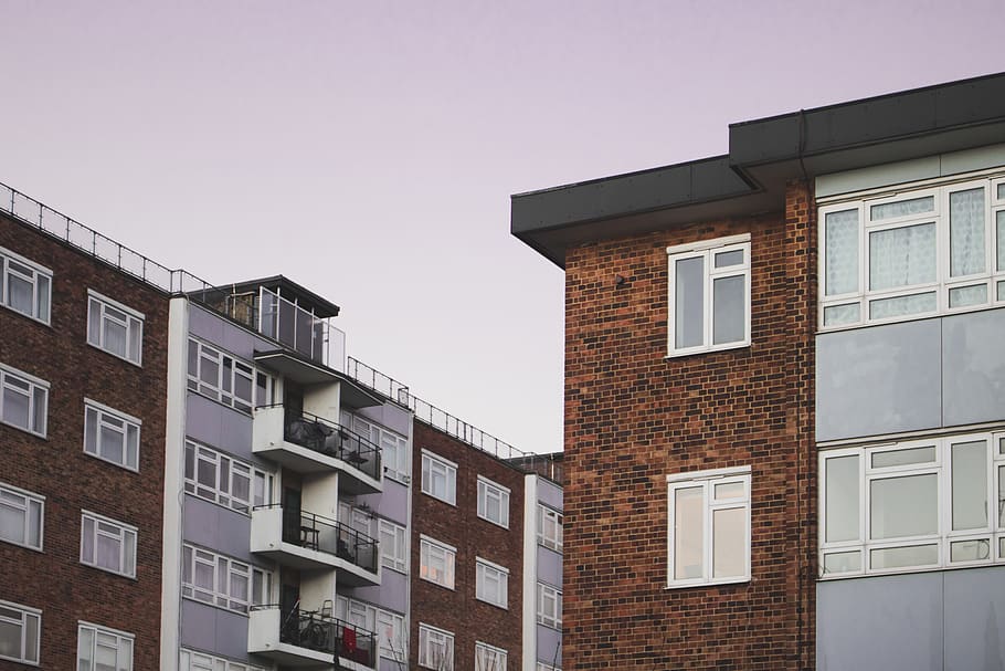brown bricked building, town, urban, high rise, city, apartment building HD wallpaper