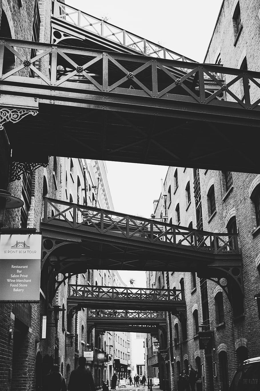 bridges grayscale photography, person, human, road, building HD wallpaper