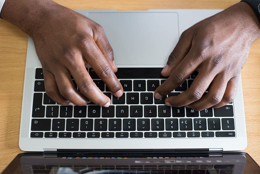 Person Typing on Laptop, contemporary, desk, electronics, hands HD wallpaper
