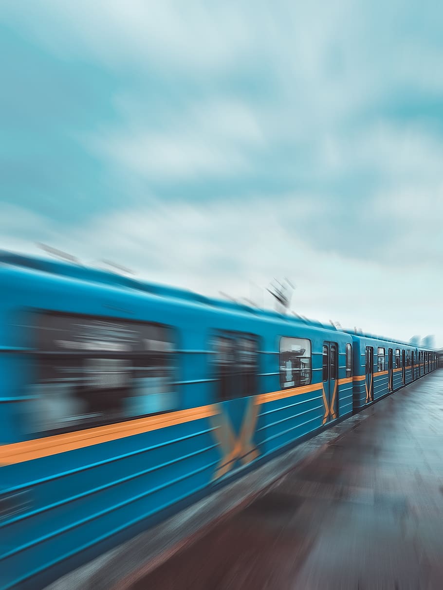 blue and yellow train time lapse photo, vehicle, transportation