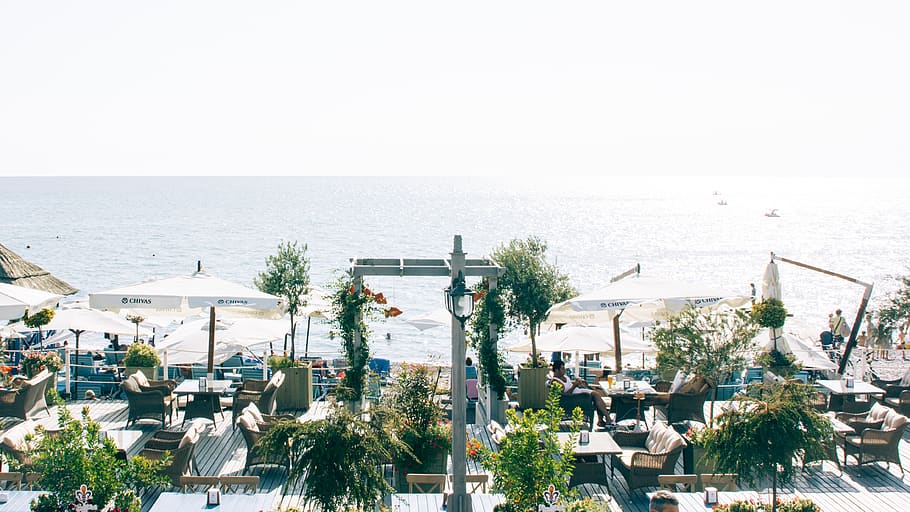 White Patio Table Set Near Ocean, beach, horizon, resort, sea HD wallpaper