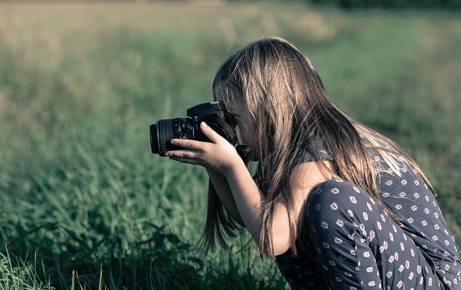 Girl Holding Dslr Camera on Green Grass Field, digital, equipment HD wallpaper