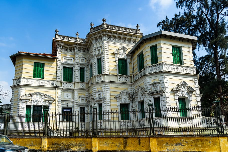 Yellow and White Painted Mansion Near Black Iron Gate, ancient HD wallpaper