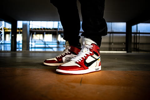 Person Wearing White Red And Black Nike X Off White Air Jordan 1 S Thumbnail 