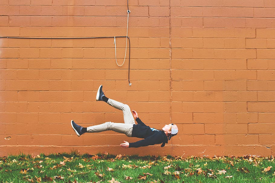 man falling on ground beside wall, human, person, apparel, clothing HD wallpaper