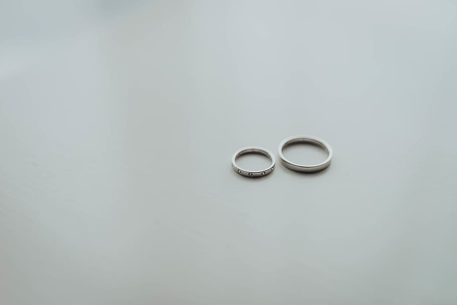round silver-colored rings, studio shot, copy space, indoors HD wallpaper