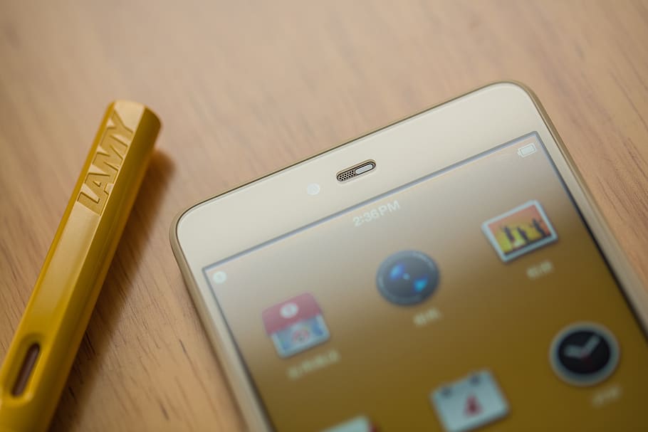 White Smartphone Near Yellow Lamy Tool, color, electronics, gadget HD wallpaper