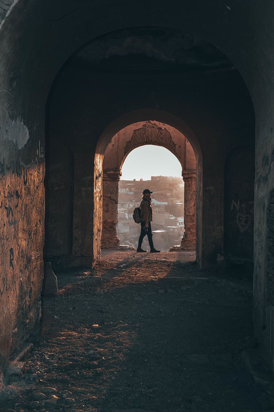 Person Standing in Building's Hallway, arches, architecture, backpack HD wallpaper