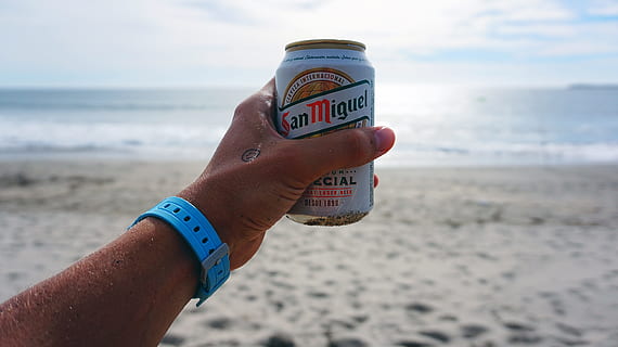 Person Holding San Miguel Beer Tin Can, beach, beachlife, blurred background HD wallpaper