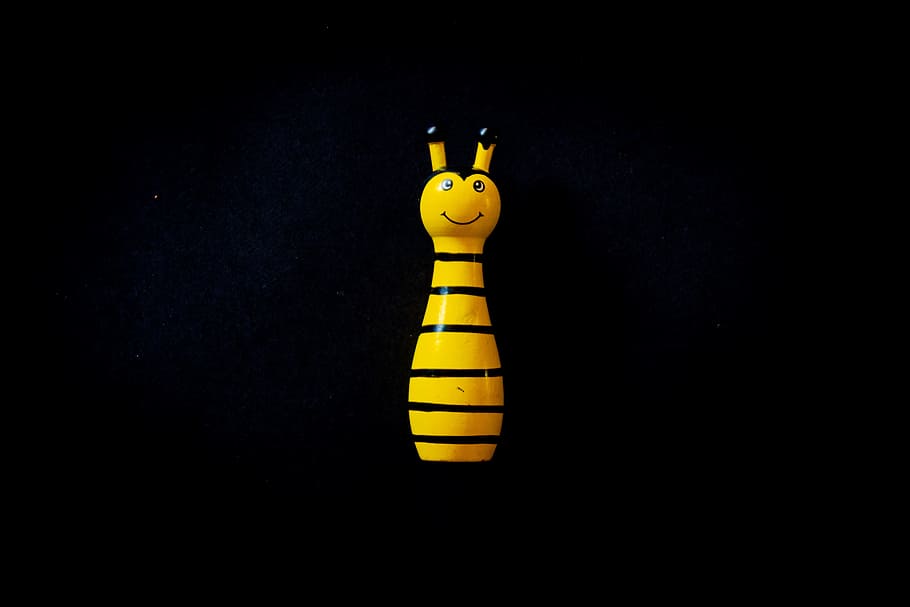 Yellow Toy, bee, black background, close-up, colors, wooden toys HD wallpaper