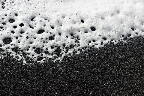 sand with white bubbles, foam, reynisfjara beach, iceland, vik HD wallpaper
