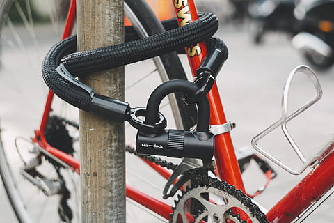 orange bicycle tired with cable lock, bike, transportation, vehicle HD wallpaper