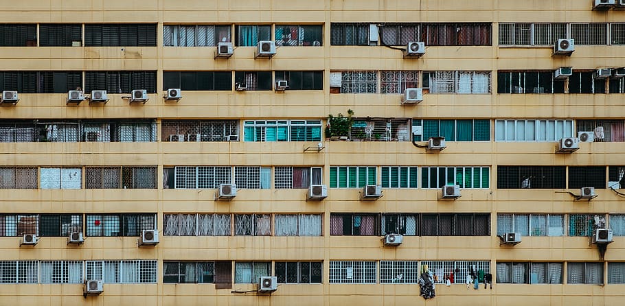 white-home-appliance-hanging-by-building