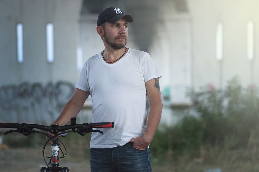 Man Wearing White V-neck T-shirt, bicycle, cap, cyclist, daylight HD wallpaper