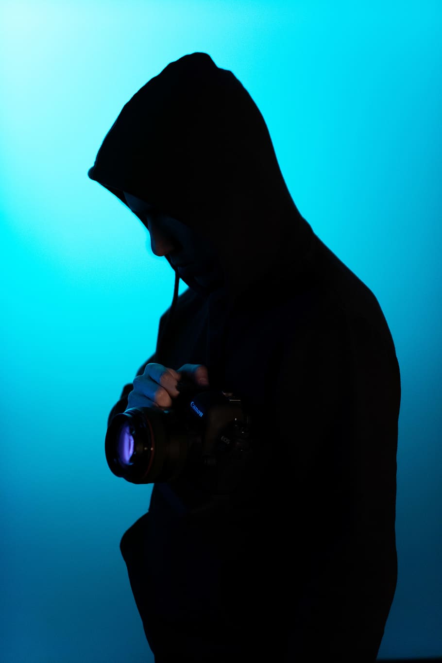 Man Holding A Camera, backlit, person, one person, studio shot HD wallpaper