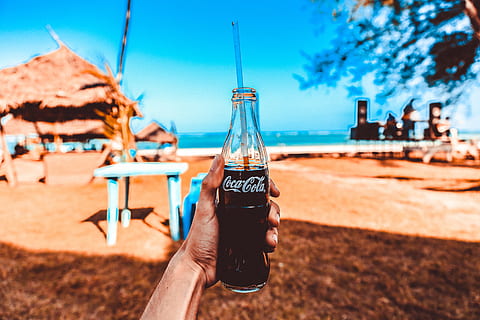 Person Holding Coca-cola Glass Bottle, beach, beach huts, blue HD wallpaper