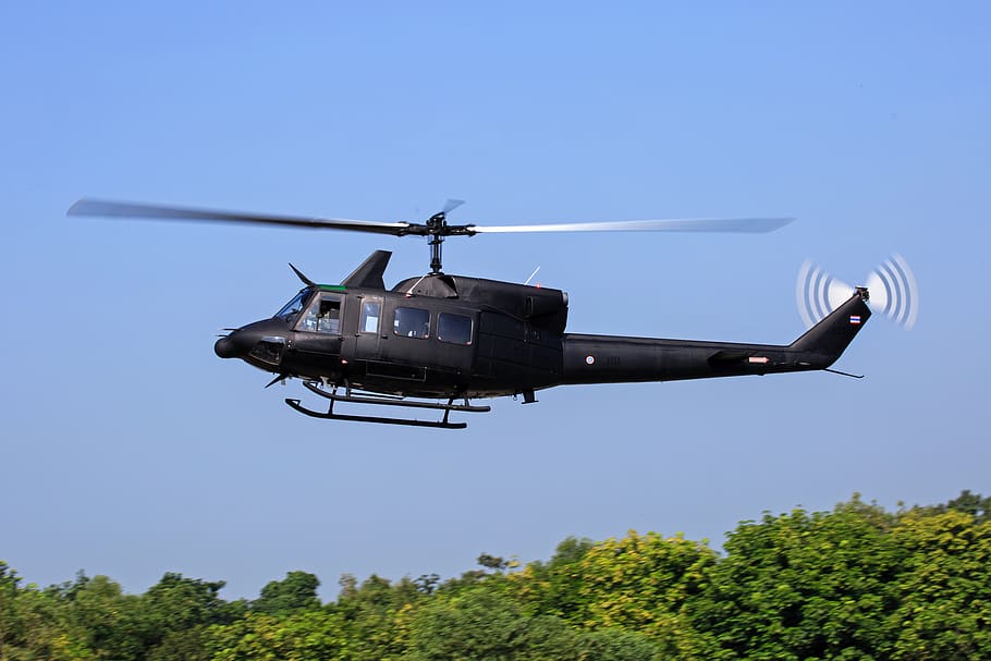 Black Helicopter Flying Above Green Trees, aircraft, flight, propeller HD wallpaper