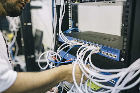 Man Connection Utp Cables on Switch Hub Inside Room, blur, data center HD wallpaper