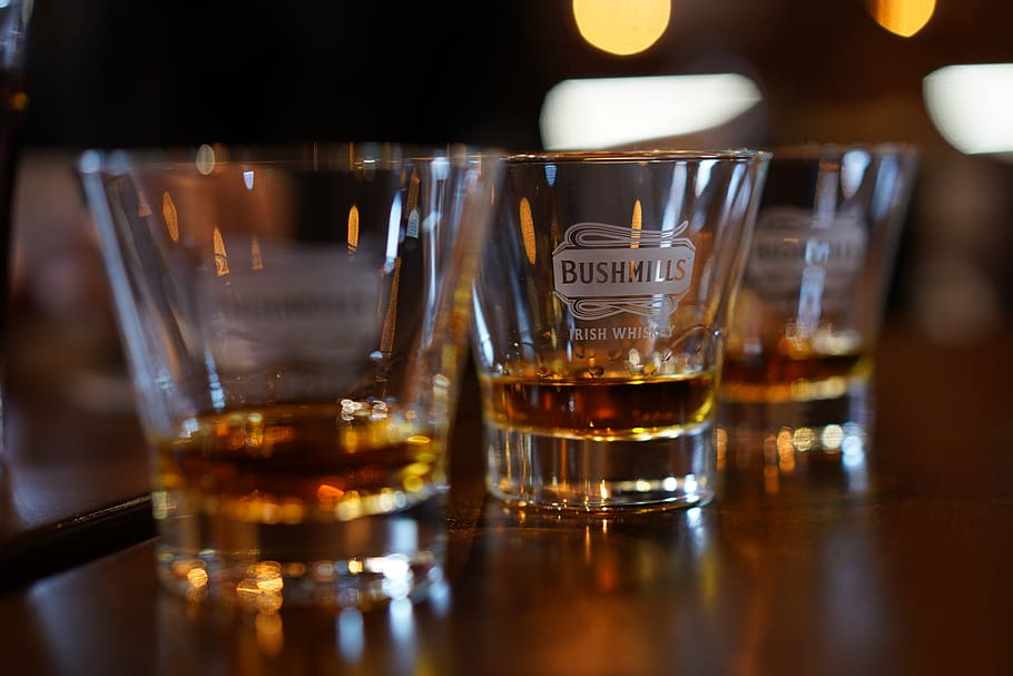three Bushmills shot glasses, alcohol, drink, refreshment, food and drink HD wallpaper