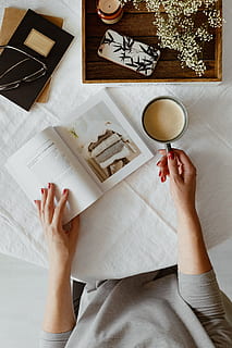 Woman read book and drink coffee, hands, relaxing, reading, time HD wallpaper