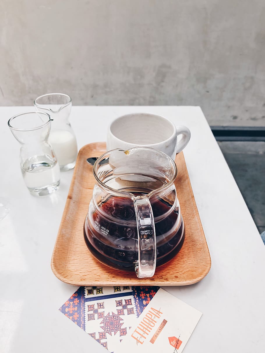 Clear Glass Coffee Pot Near White Mug on Brown Tray, brewed coffee HD wallpaper