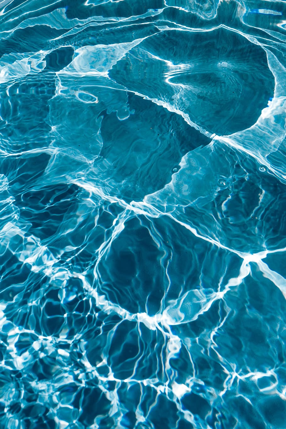 Wavy water surface in a swimming pool, wave, abstract, background