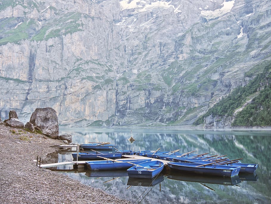 jon boats on body of water, vehicle, watercraft, vessel, transportation