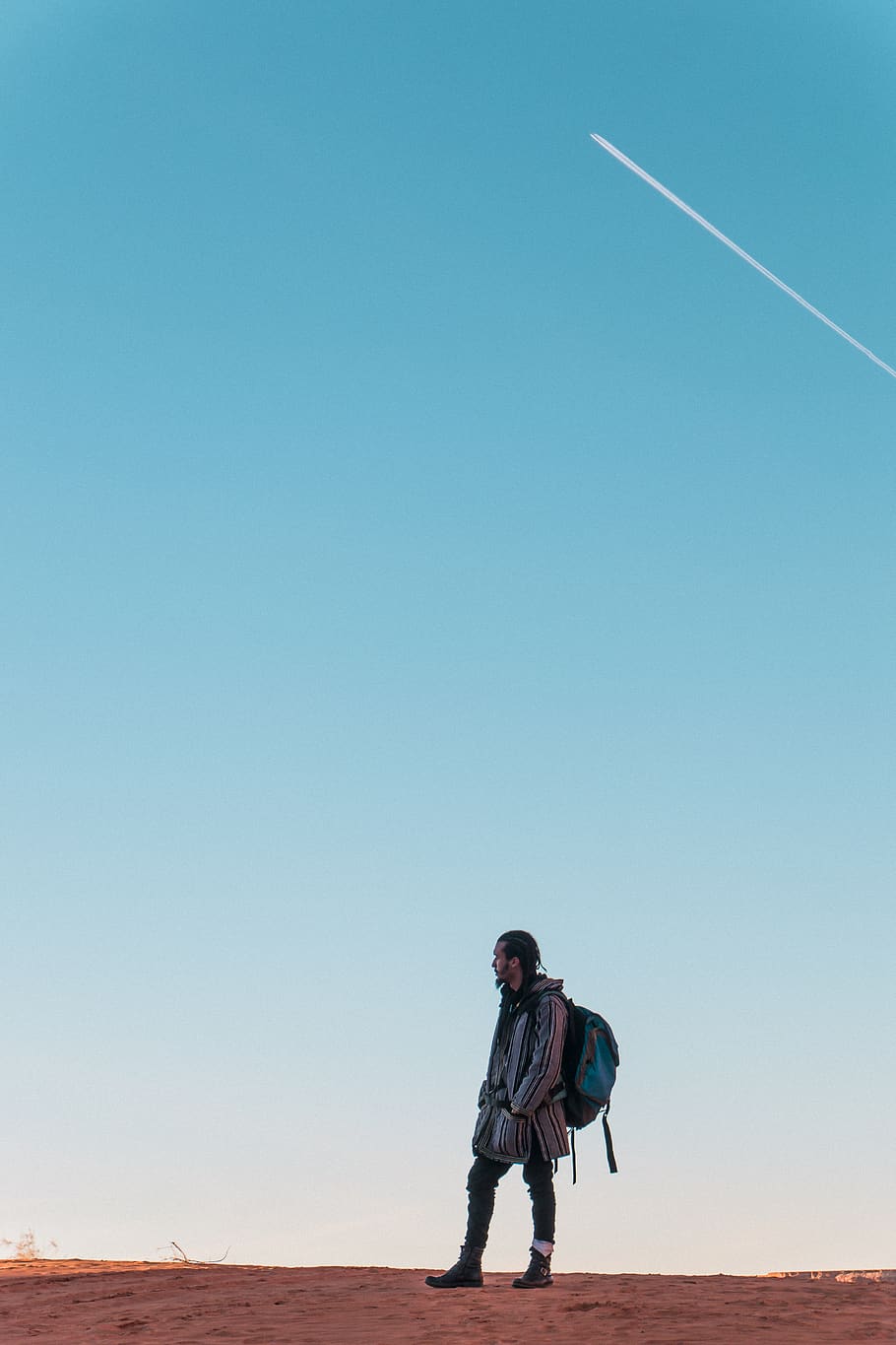 man wearing backpack standing on ground during daytime, human, HD wallpaper