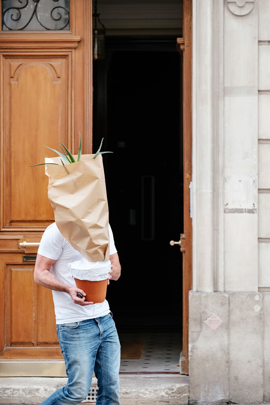 man's head covered in paper bag, jeans, apparel, clothing, pants, HD wallpaper