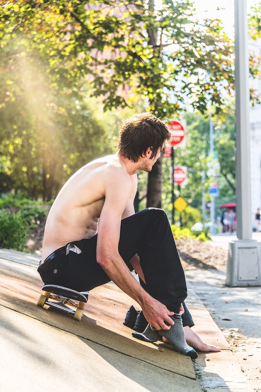 man sitting on skateboard, person, human, clothing, apparel, outdoors HD wallpaper