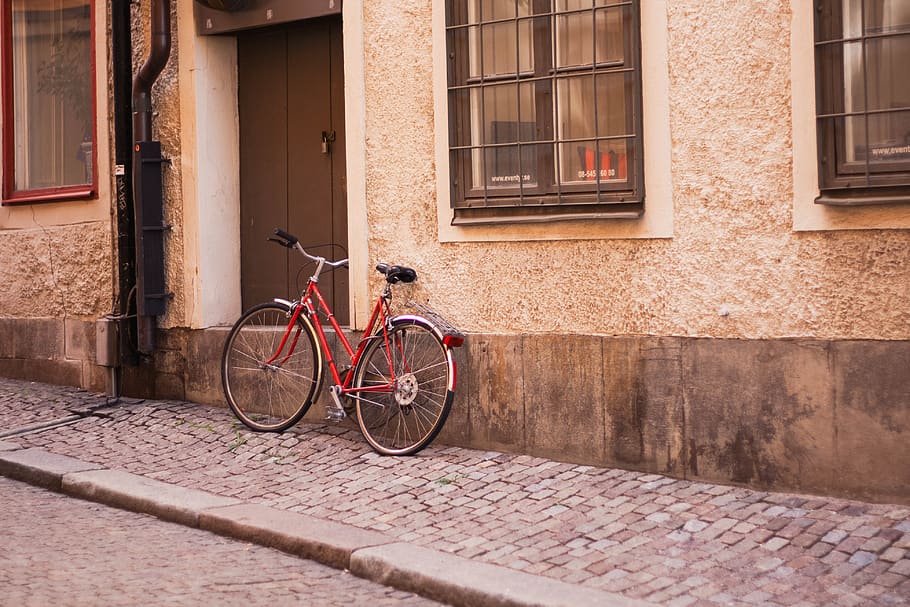 Photo of Bicycle Parked On Table, bricks, building, door, doorway HD wallpaper