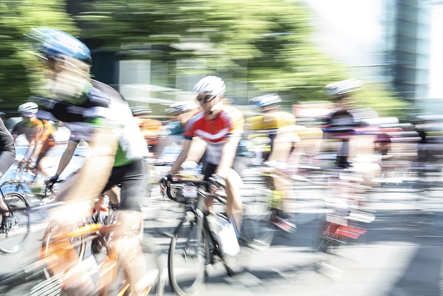 People Riding Bicycles on Road, bikers, blur, blurred, blurry HD wallpaper