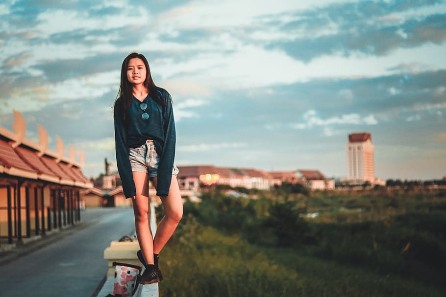 Woman Standing On Edge Of Wall, beautiful, daylight, girl, laos, HD wallpaper