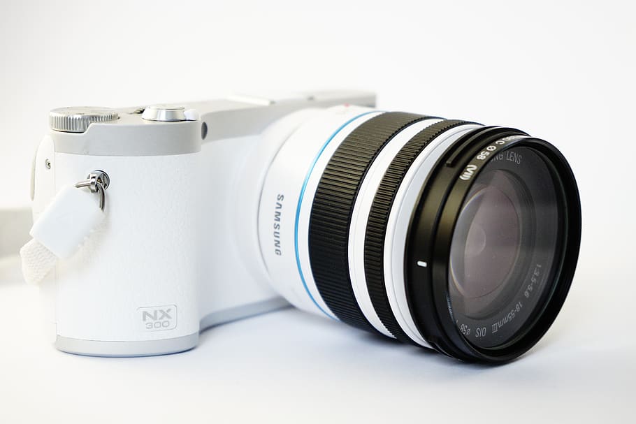 White and Black Samsung Nx 300 Dslr Camera on White Surface, digicam HD wallpaper